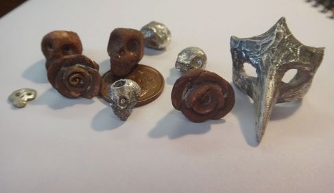 skull and rose beads and mask