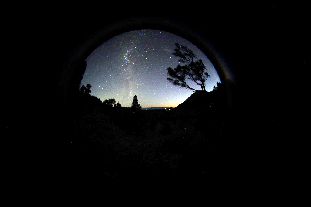 fisheye lens stars and faint aurora over Lake Wairarapa
